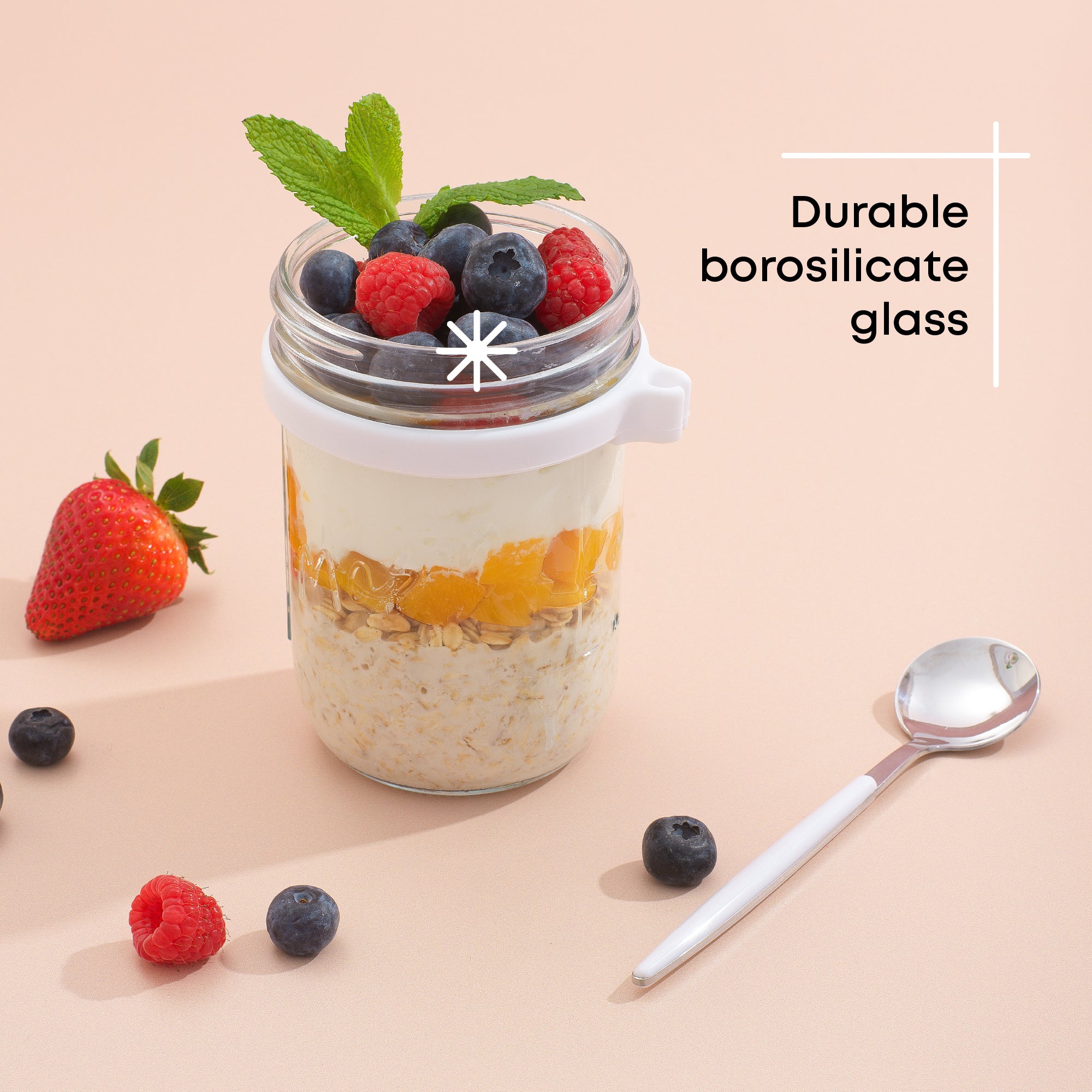 Durable borosilicate glass overnight oats container filled with fruit and yogurt. 