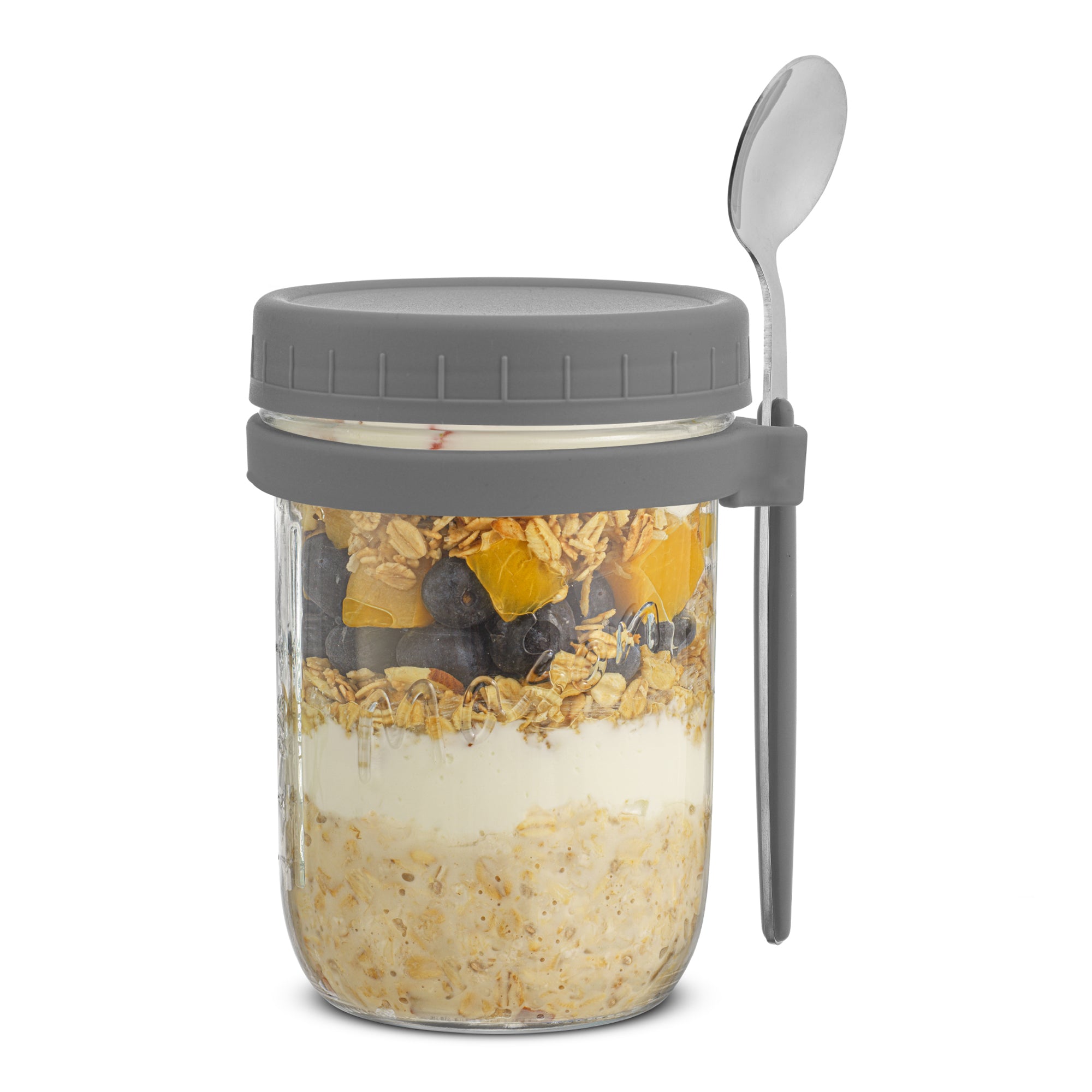 Closed lid of a grey overnight oats container filled with fruit, yogurt, and granola. 