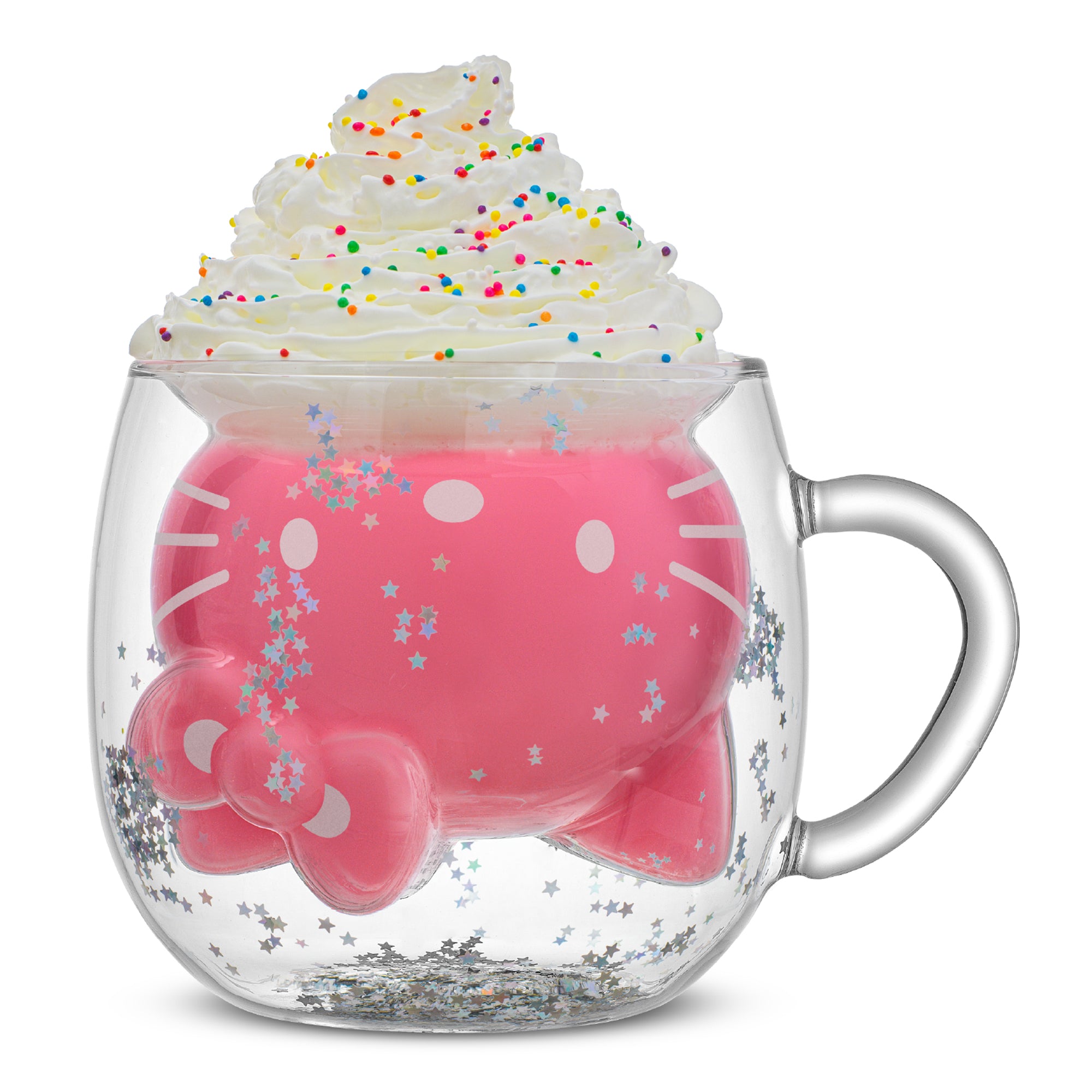 A Hello Kitty mug with a 3D Hello Kitty and glitter inside filled with a pink drink and topped with whipped cream.