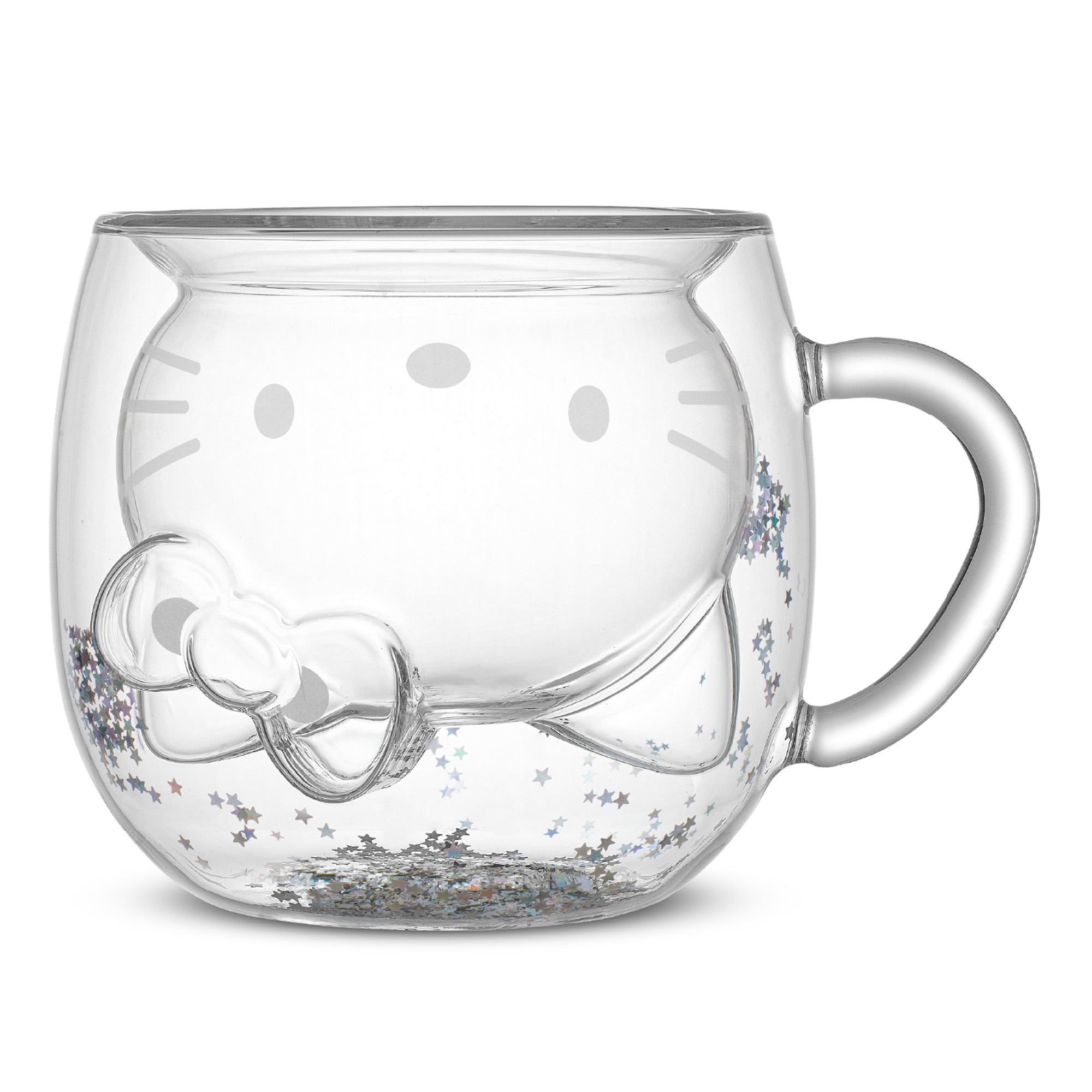 A clear glass double wall mug with a 3D Hello Kitty face inside. The mug is a collectible item celebrating Hello Kitty's 50th anniversary. 