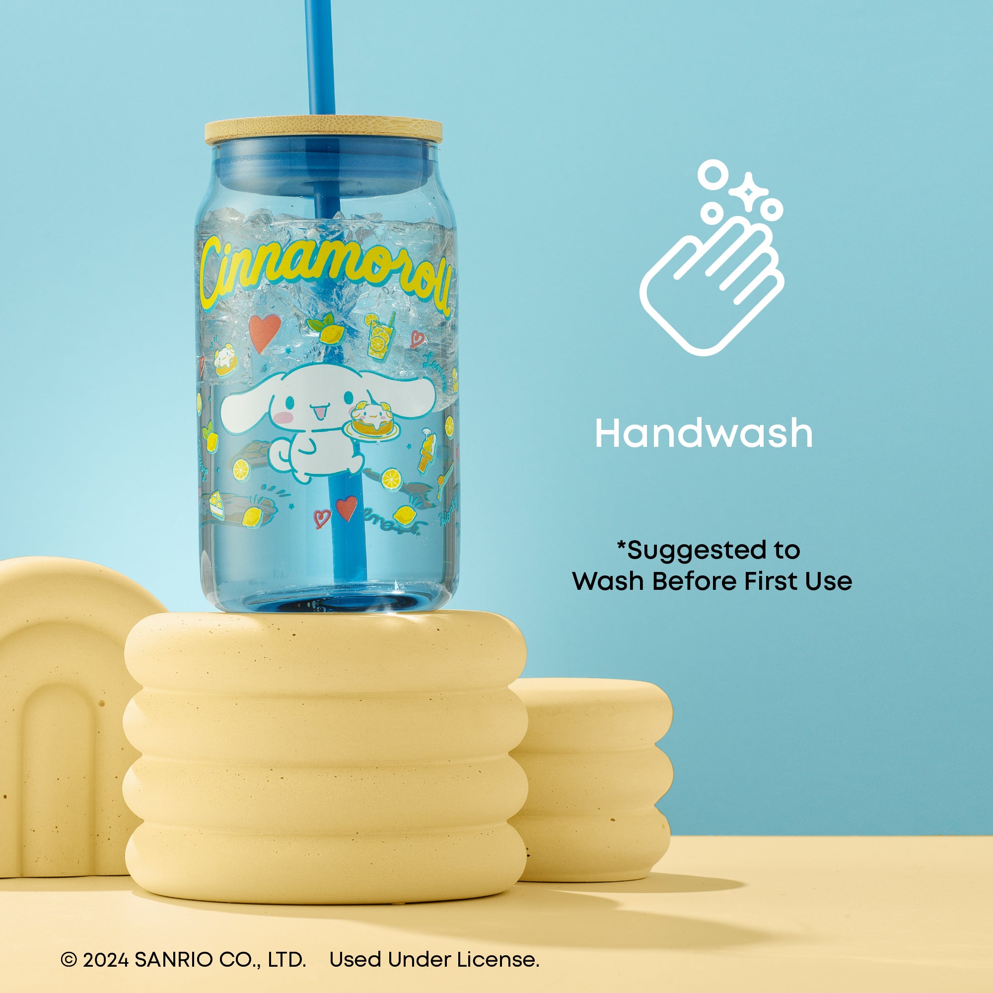 A blue tumbler glass featuring Cinnamoroll with a bamboo lid and blue straw on a blue background. Text on the image reads, "Handwash *Suggested to wash before first use." 