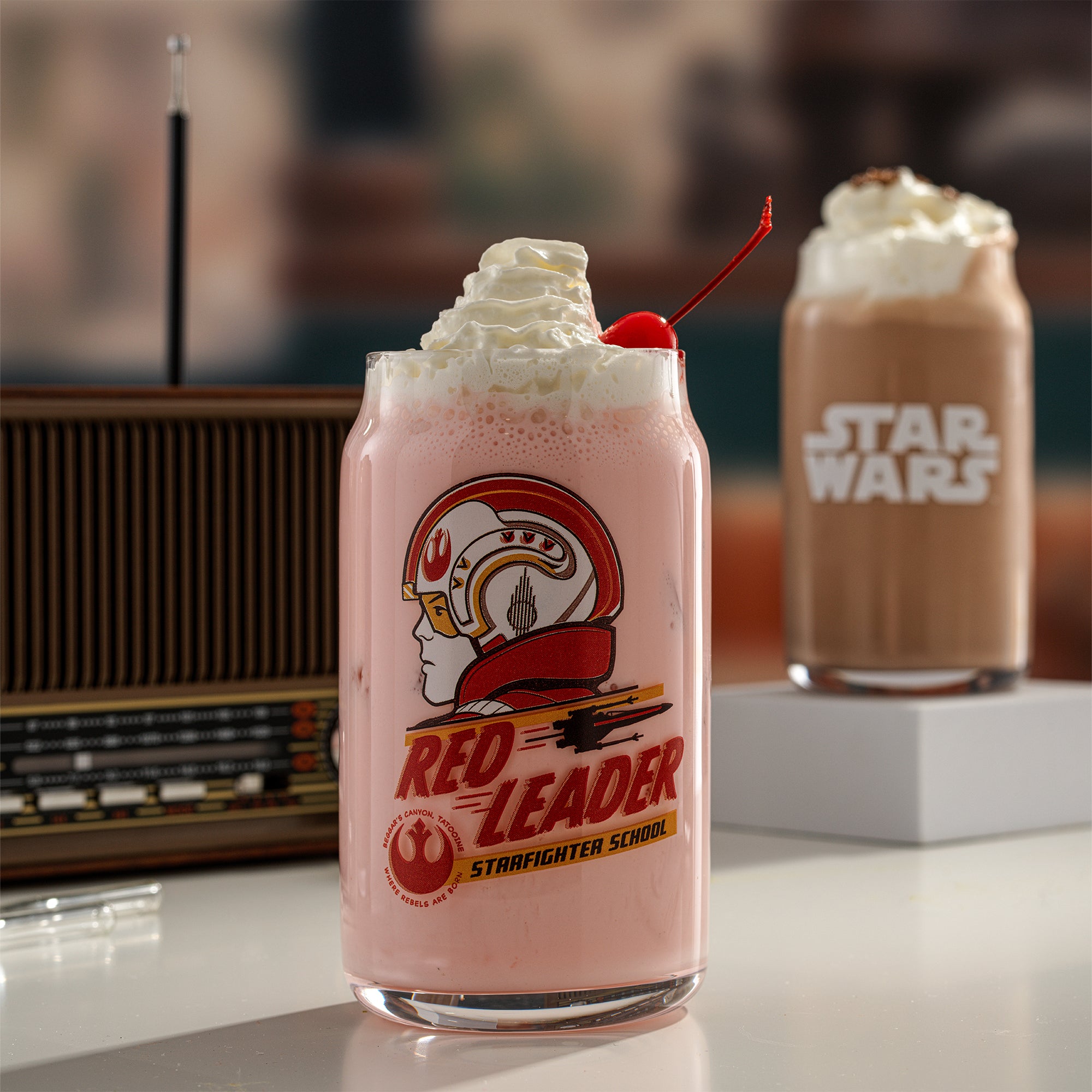 Retro-inspired Star Wars can-shaped drinking glasses featuring the Red Leader and the Star Wars logo.